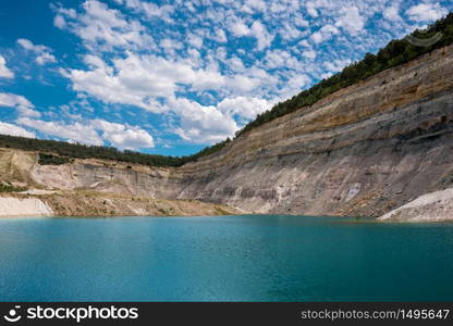 Turqoise lake in an open pit mine in guadalajara, Spain