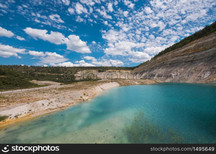 Turqoise lake in an open pit mine in guadalajara, Spain