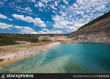 Turqoise lake in an open pit mine in guadalajara, Spain