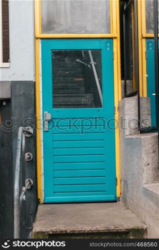 Turquoise door in typical residential house