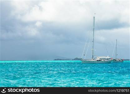 Turquoise sea and anchored yachts, Tobago Cays, Saint Vincent and the Grenadines, Caribbean sea