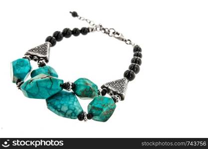Turquoise with black onyx bead bracelet isolated on white background