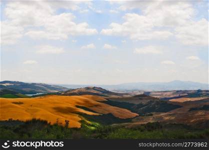 Tuscany Landscape With Pond on a Cloudy Day