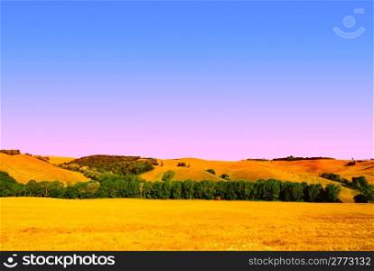 Tuscany Landscape With Sloping Meadows In The Morning