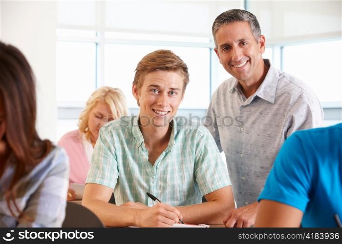 Tutor helping student in class