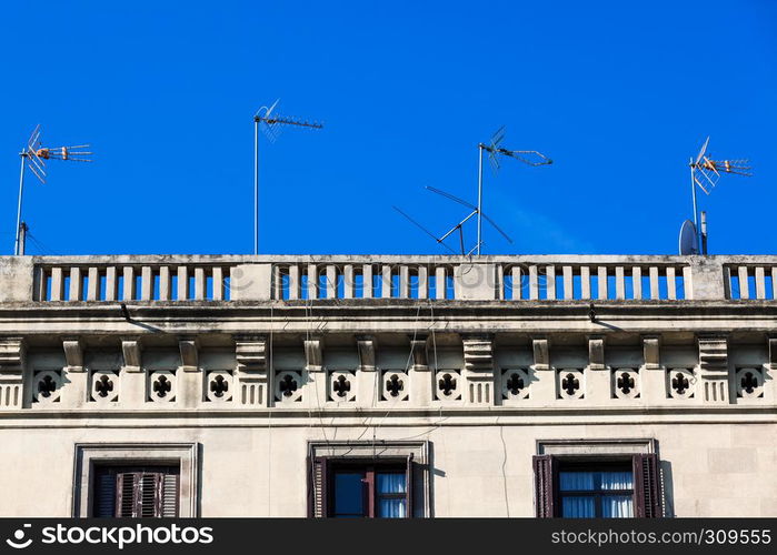 TV antennas on the roof of the house