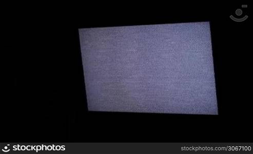 TV panel with white noise and sound.