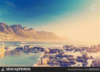 Twelve Apostles in South Africa at sunset with retro Instagram style filter effect