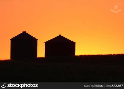 Twilight and granary silhouettes