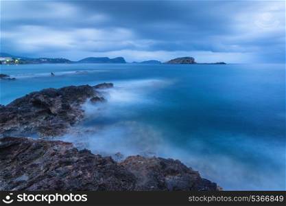 Twilight landscape over beautiful rocky coastline in Mediterranean Sea
