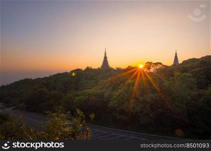 Twilight Moments sunset or sunrise Above the sacred pagoda at Doi Inthanon National Park, Chiang Mai, Thailand.. Doi Inthanon National Park