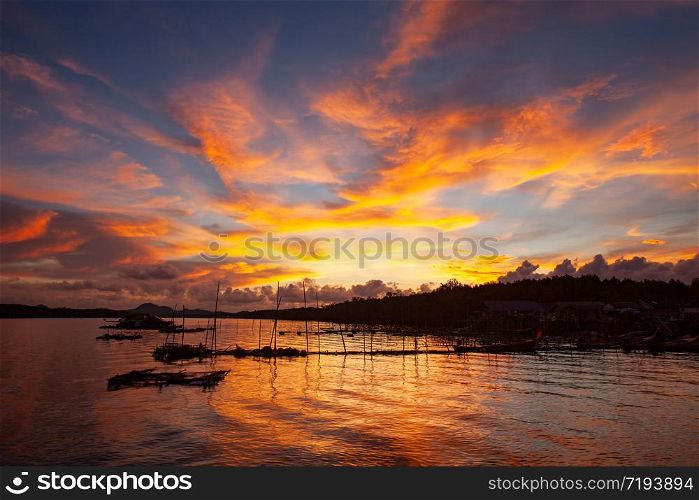 Twilight time for landscape with fish cage farm in Phang Nga bay