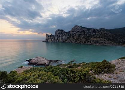 Twilight time on rocky coast of Black Sea. Novyi Svet. Crimea. Ukraine