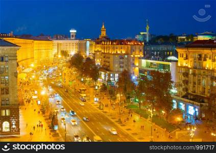 Twilight view of Kiev cityscape with illuminated Khreshatyk street in downtown aerial view, Ukraine