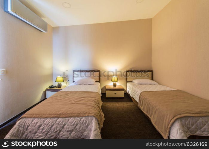 Twin room in modern hotel