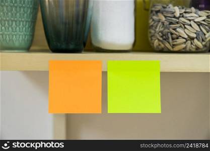 two adhesive notes kitchen