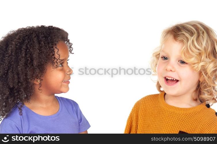 Two adorable children looking at each other isolated on a white background