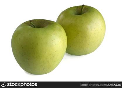 "Two apples of the variety "golden" isolated on white."