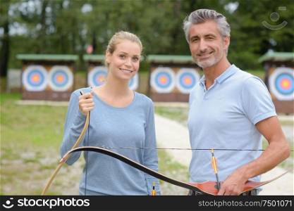 two archers at the shooting range