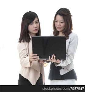 Two asian business woman in office, business talking with notebook