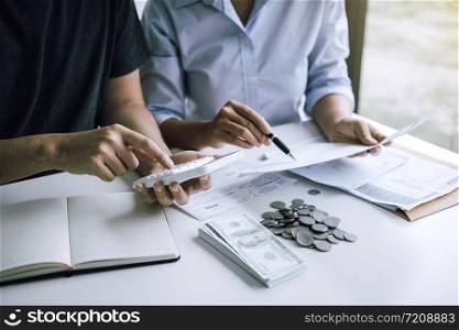 Two asian couples and men and women are together analyzing expenses or finances in deposit accounts and daily income sources with an savings economical concept.