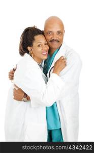 Two attractive african-american doctors having a love affair. Isolated on white.