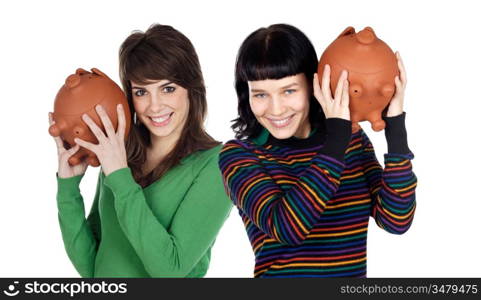 Two attractive girls with money box on a over white background