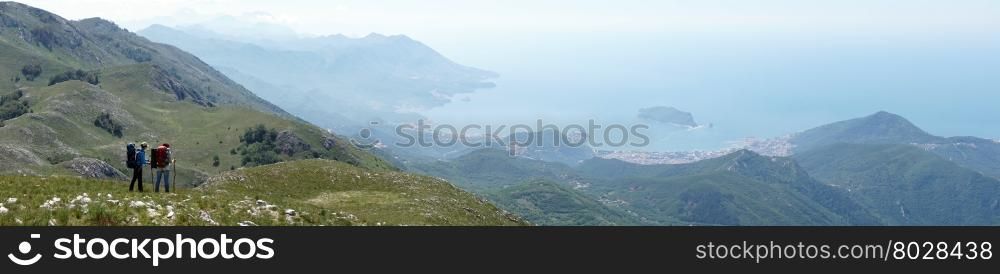 Two backpackers on the mount on the Adriatic coast of Montenegro