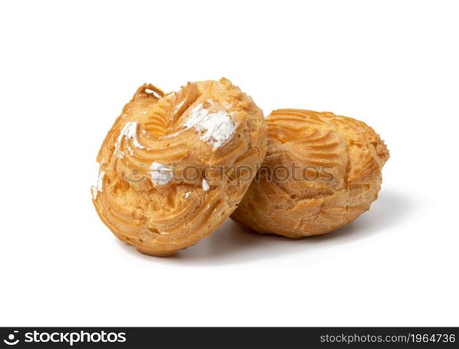 two baked round eclairs on a white background