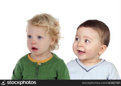 Two beautiful children looking at side isolated on a white background