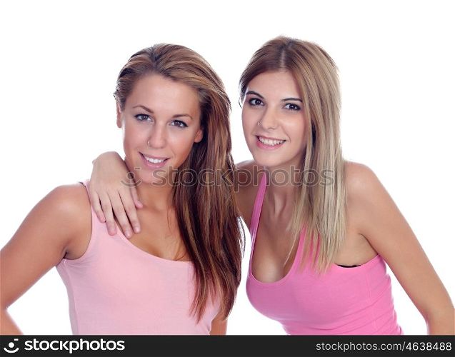 Two beautiful girl friends in pink isolated on a white background