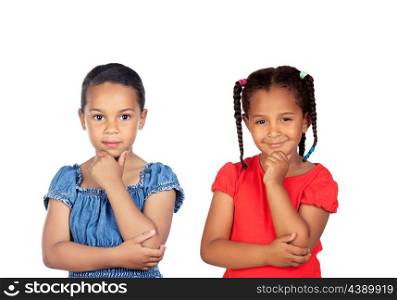 Two beautiful little girls thinking isolated on a white background