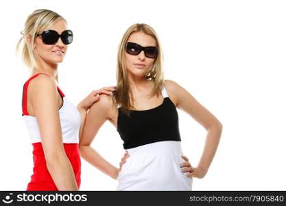 Two beautiful sexy crazy women in summer clothes and sunglasses. Studio shot isolated on white background