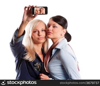 two beautiful women in formal dressed taking photo with a smart phone
