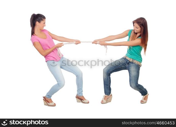 Two beautiful women pulling a rope isolated on a white background