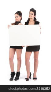 two beautiful young women models dressed for nightclub with sign