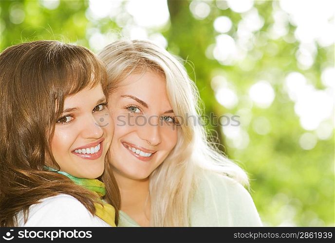 Two beautiful young women outdoors