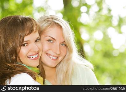 Two beautiful young women outdoors