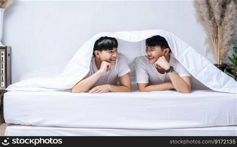 Two beloved young men slept in bed together.