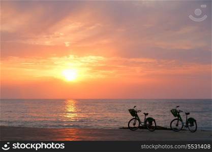 Two bicycles on Batumi beach, sunset&#xA;