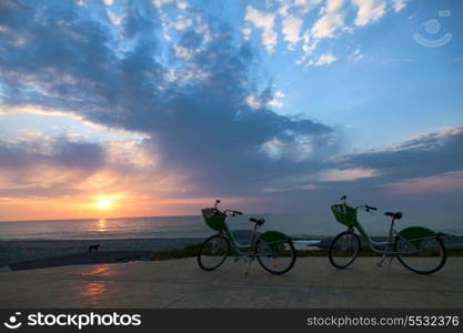 Two bicycles on Batumi beach, sunset&#xA;