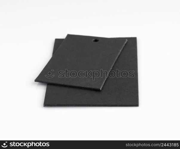 two black price tags isolated on white background. the label on a light background