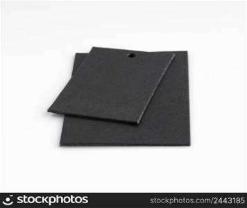 two black price tags isolated on white background. the label on a light background