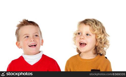 Two blond children laughing isolated on a white backround