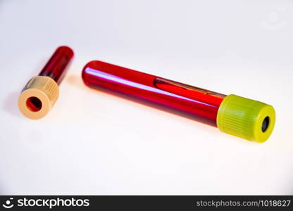 Two blood test tubes isolated on white background. Blood test tubes