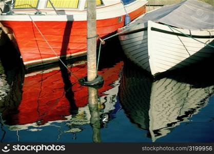 Two boats docked at the harbor, Funen County, Denmark