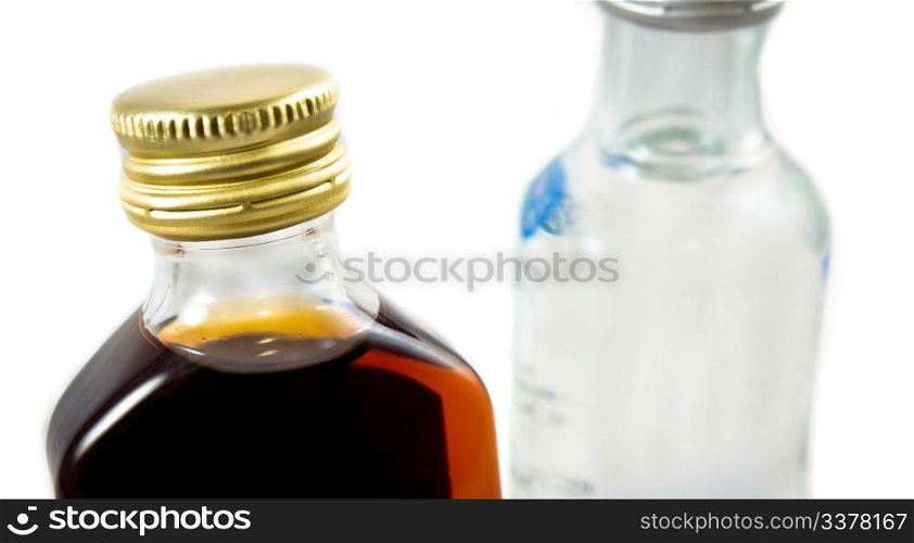 Two bottles of liquor on a white background