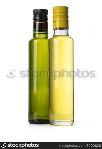 Two bottles of virgin olive oil on a white ground with clipping path