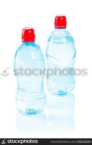 two bottles with water isolated on white
