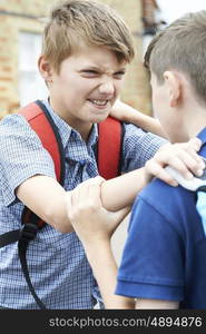 Two Boys Fighting In School Playground